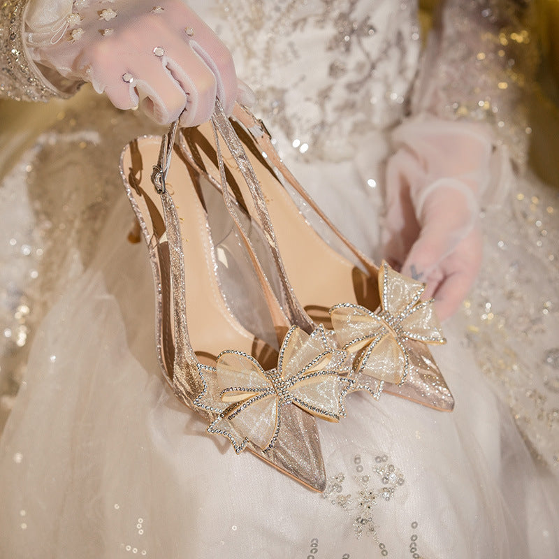 Zapatos de tacón alto de cristal francés con lazo para boda, diamantes de imitación, puntera puntiaguda, sandalias de verano para mujer, zapatos de novia dorados