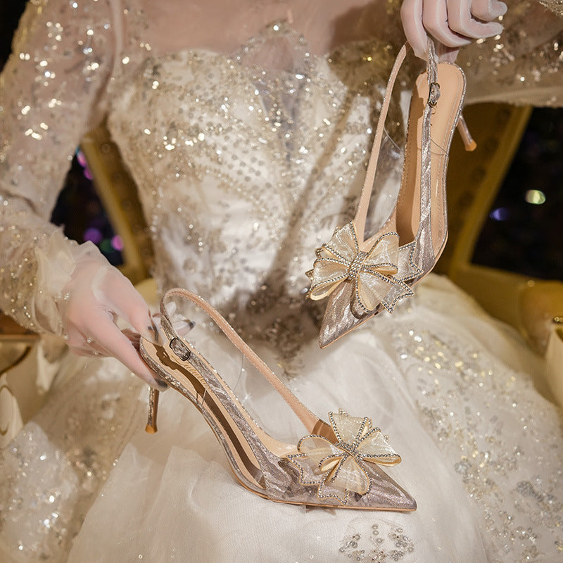 Zapatos de tacón alto de cristal francés con lazo para boda, diamantes de imitación, puntera puntiaguda, sandalias de verano para mujer, zapatos de novia dorados