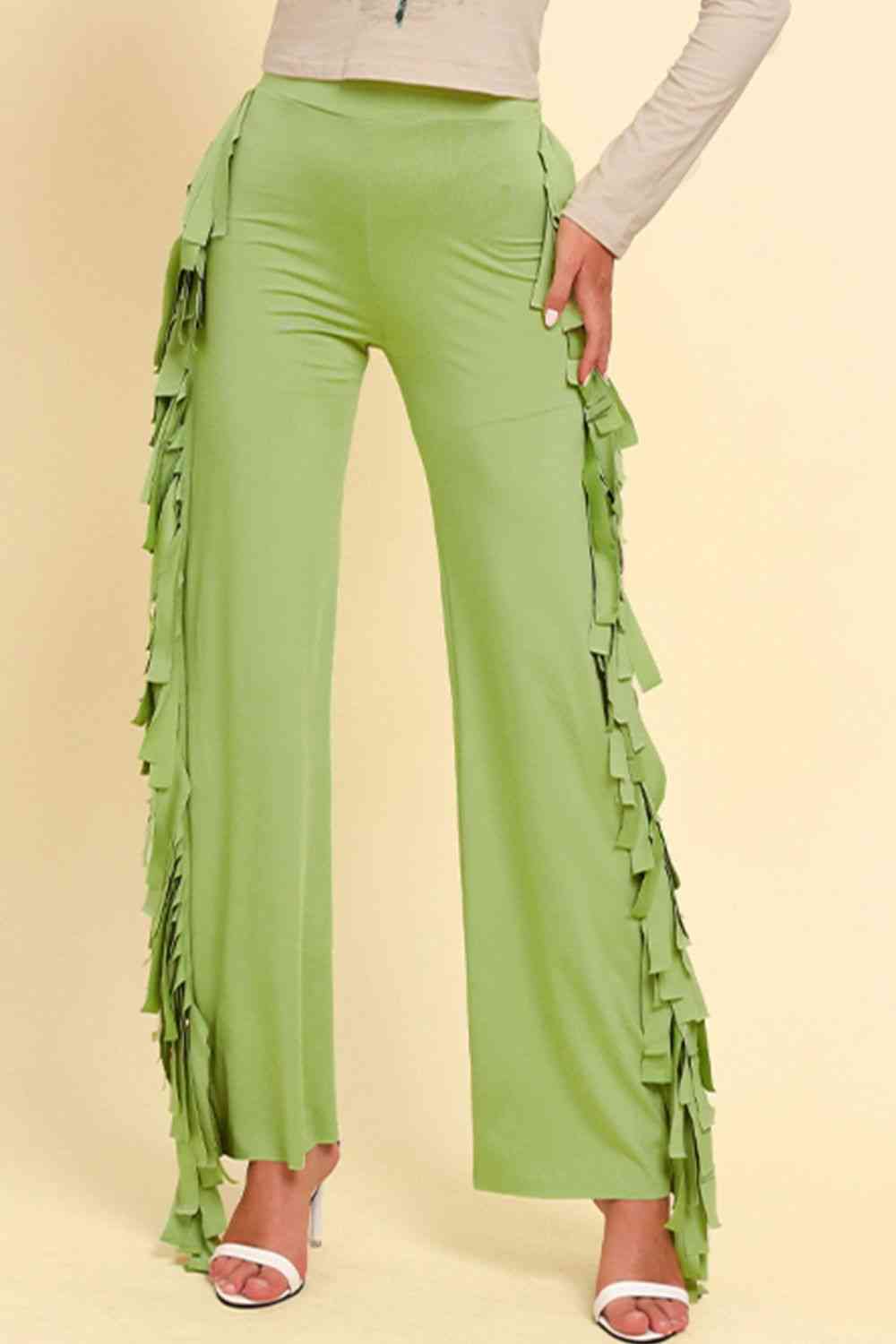 Pantalones anchos con ribete de flecos