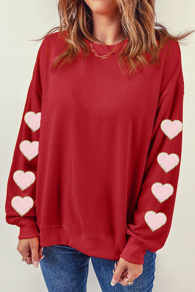 Sudadera con hombros caídos y cuello redondo con corazón