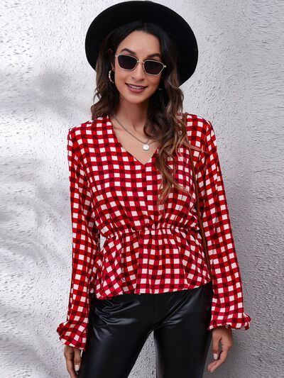 Blusa peplum con manga globo y cuello en V a cuadros