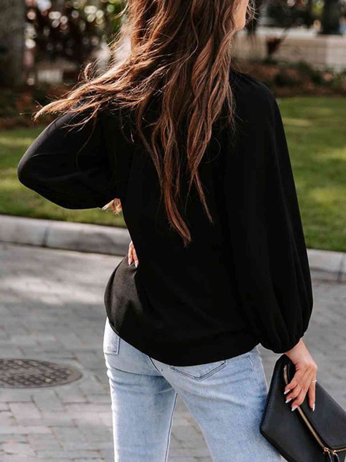 Blusa de manga larga con cuello con muescas