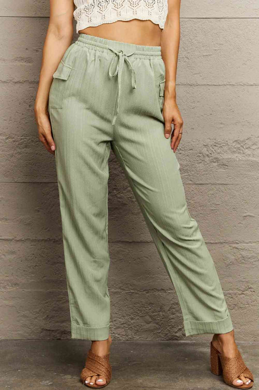 Pantalones largos con cintura anudada