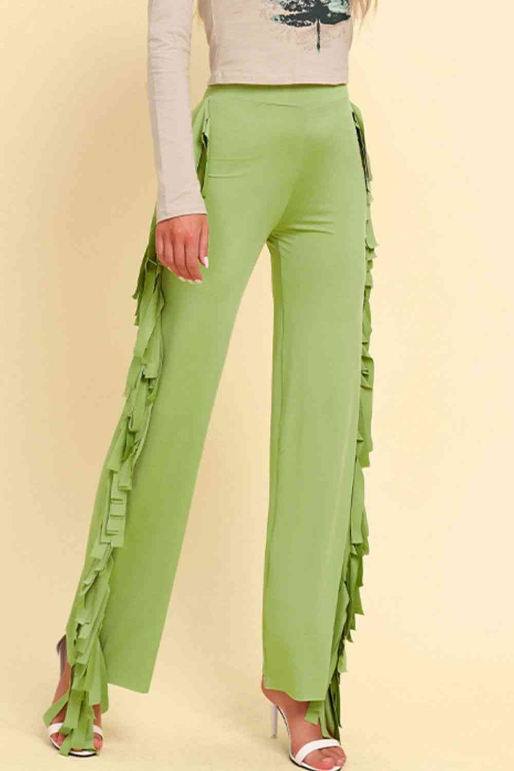 Pantalones anchos con ribete de flecos