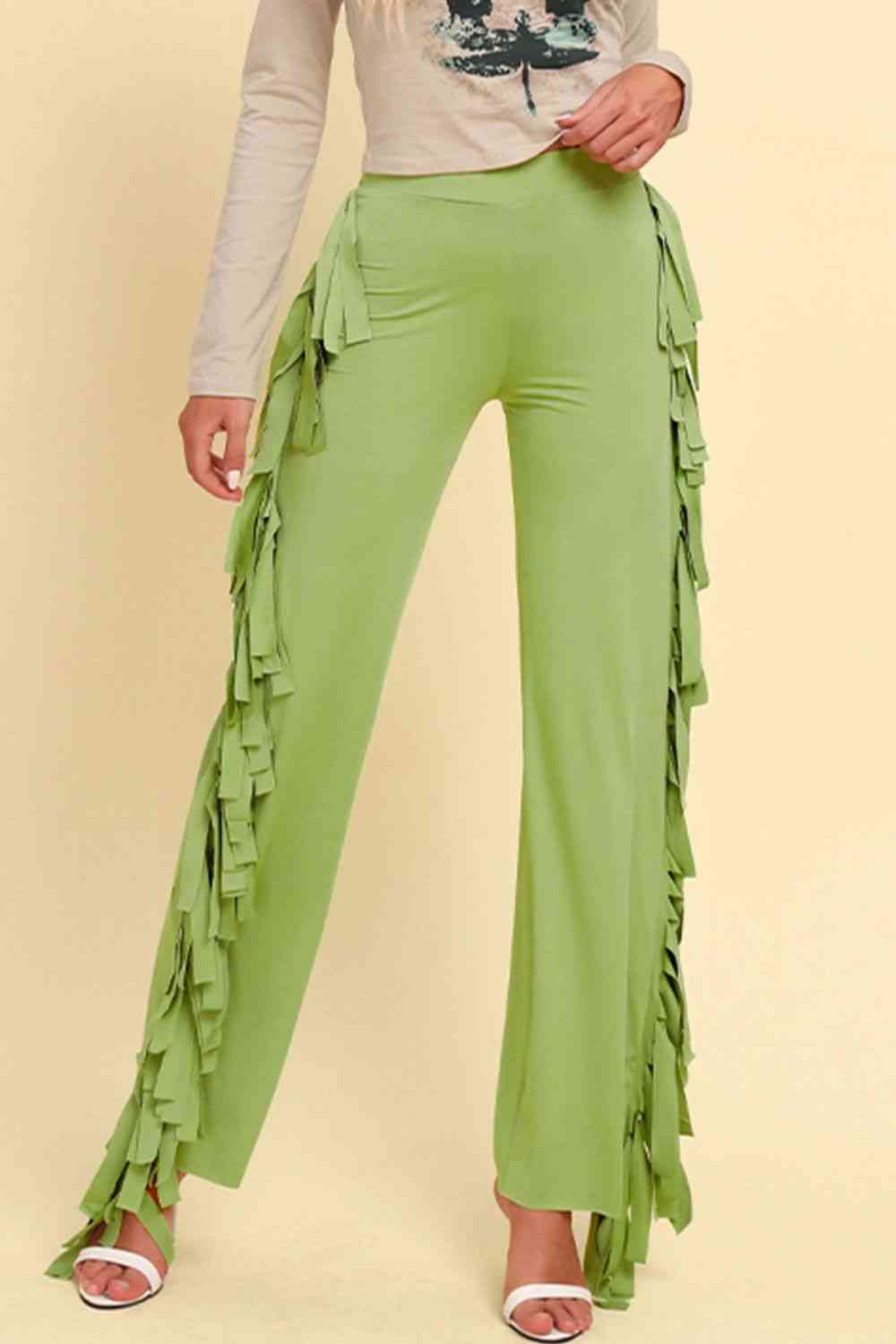 Pantalones anchos con ribete de flecos